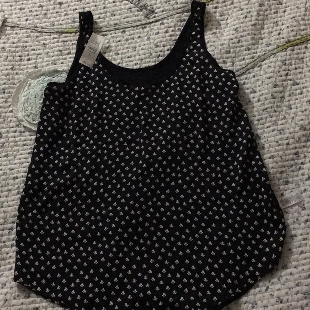 Two sleeveless blouses